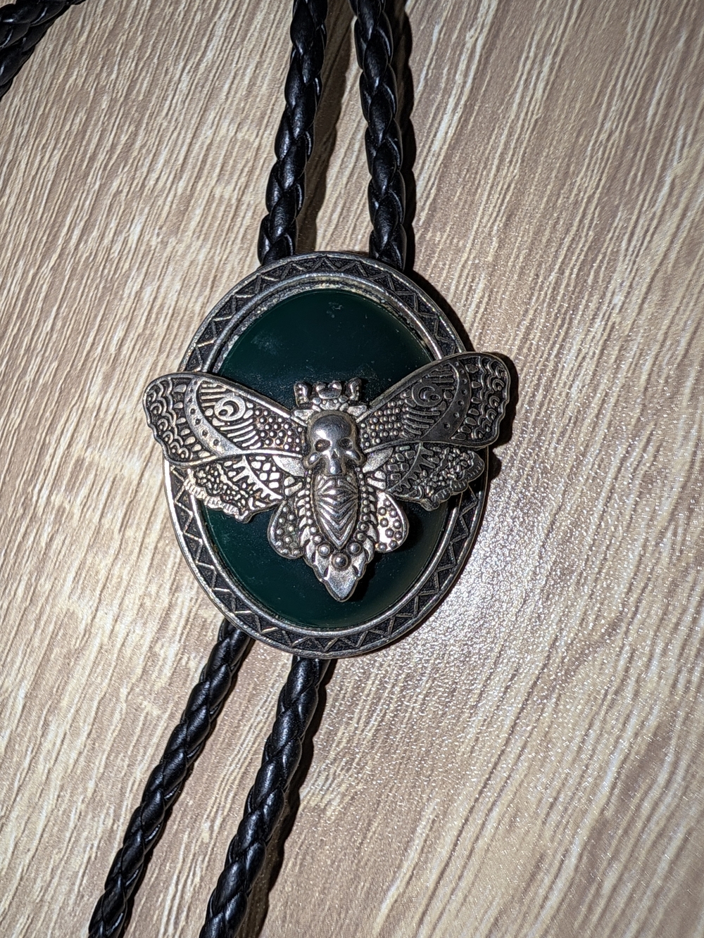Moth Skull And Dark Green Bolo Tie with Silver-Tone Accent
